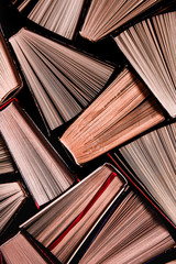 Many old books in a book shop or library. Shallow DOF