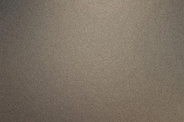 Brown-gray background. The texture of the stone.