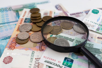 Magnifying Glass on the Russian Currency Background