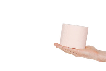 Roll of pink toilet paper on white background.