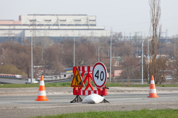 Sign road works and speed limit forty, road works.