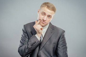 business man with toothache looks like hes in pain and need to go to the dentist