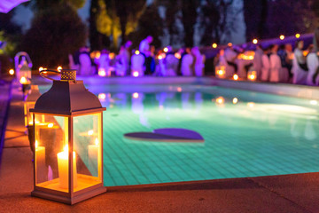 wedding reception by the pool at night