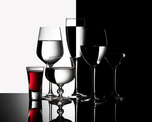 
Six glass goblets on a black and white background