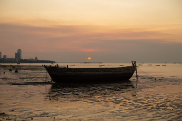 Naklejka premium Wooden vintage boat in the twilight time