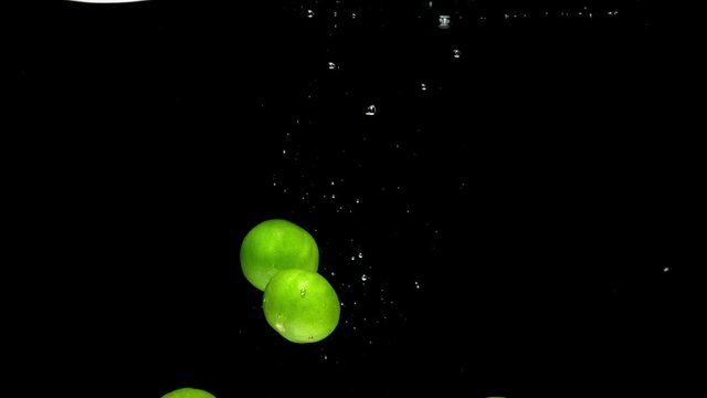 lime drop in water slower motion