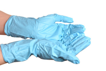 Hands in blue protective gloves over white