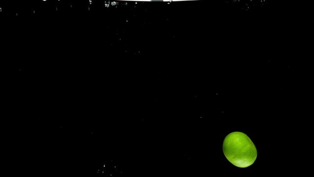lime drop in water slower motion