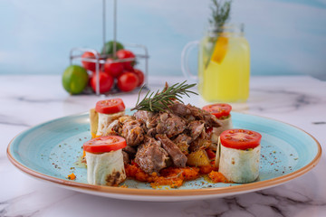 grilled meatballs served with butter