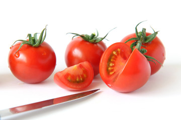 Mini panicle tomatoes on white background