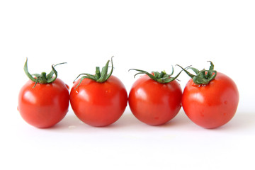 Mini panicle tomatoes on white background