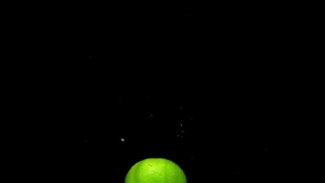 lime drop in water slower motion