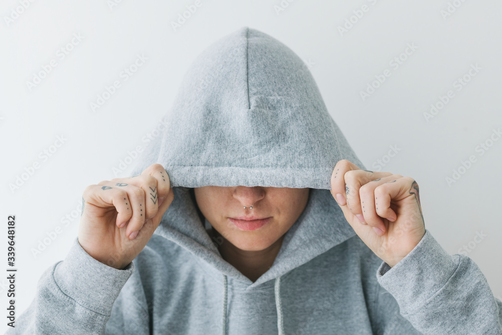 Wall mural model wearing gray hoodie