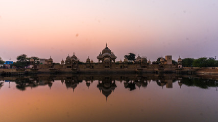 Heritage Kusum Sarovar, a historical sandstone monument on the holy Govardhan Hill between...