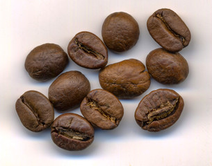 roasted coffee beans on white background.