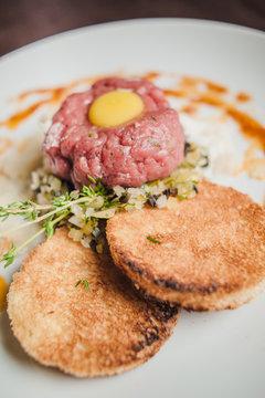 veal tartare with chicken yolk and toast