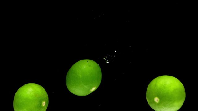 lime drop in water slower motion