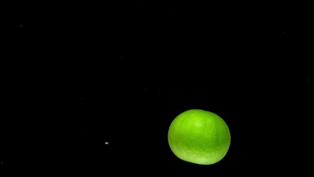 lime drop in water slower motion
