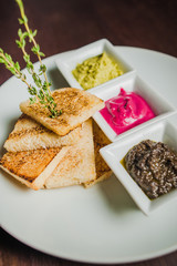 toast with horseradish, garlic butter and aubergine paste