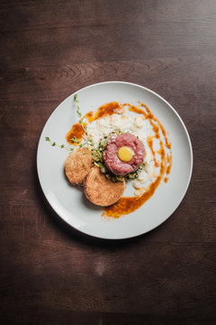veal tartare with chicken yolk and toast