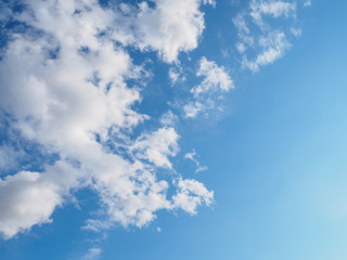 Cumulus clouds and blue sky in sunny day, nature background.