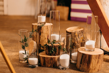 Burning candles on table indoors