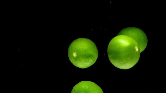 lime drop in water slower motion