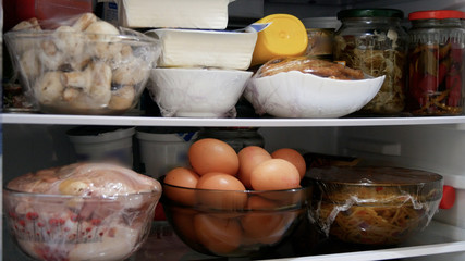 Refrigerator Filled with Prepared Food, Meat, and Vegetable,  Food Reserve Stored at a Cool Temperature