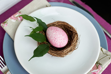 Easter egg on a served table