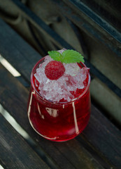 raspberry jam on a wooden table