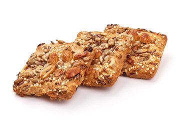 Cookies with nuts and seeds, isolated on white background