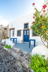 Fototapeta na wymiar Typical Greek archirecture, blue and white house in Imerovigli village, Santorini, Greece