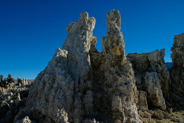 Mono Lake is a saline soda lake in Mono County, California known for its Tufa Towers or pillars of limestone formations.
