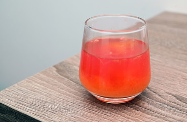 Mixed citrus juices in a glass