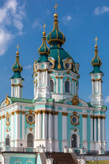 Fototapeta na wymiar Beautiful view of St. Andrew's Church, St. Andrew's Descent, Podil, Dnieper. Kiev. Ukraine.