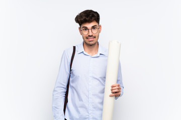 Young architect man over isolated white background having doubts and with confuse face expression