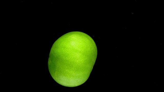lime drop in water slower motion