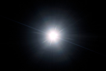 Optical lens flare on black background.