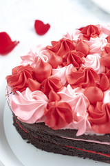 
chocolate heart cake on white background