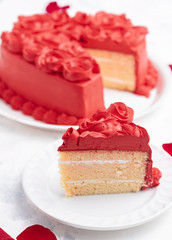 
vanilla heart cake with roses on white background