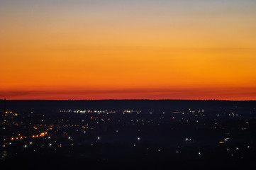 Fototapeta premium Sunset on the background of the city in spring