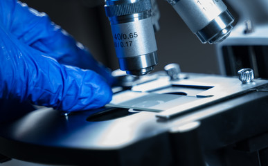 Close-up shot of Laboratory microscope with sample glass.