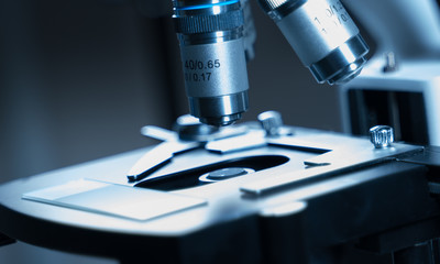 Close-up shot of Laboratory microscope with sample glass.