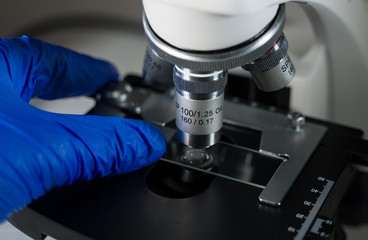 Close-up shot of Laboratory microscope with sample glass.