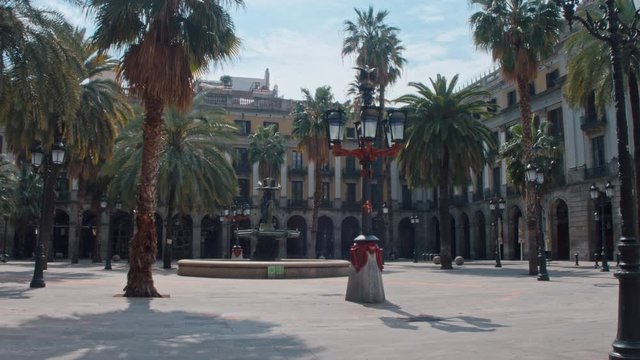 4K Pla&ccedil;a Reial in Barcelona, Spain in April 2020 empty fountain and deserted square on lockdown, coronavirus pandemic