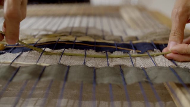 Japanaese noren closeup weaving flowers