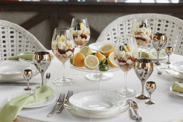 Fototapeta premium Table with pastry. Desserts served table