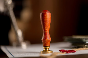 Notary's public pen and stamp on testament and last will. Notary public tools.