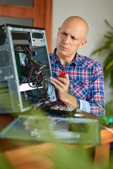 Computer engineer working on broken console