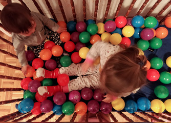 Fototapeta na wymiar Kids playing with balls